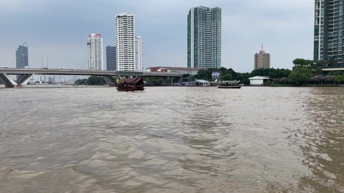 The fast-flowing Chao Phraya River in central Bangkok, Thailand